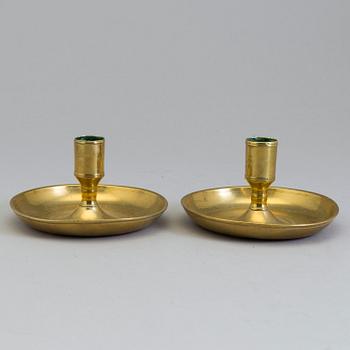 A pair of Swedish 18th century travelling brass candlesticks.