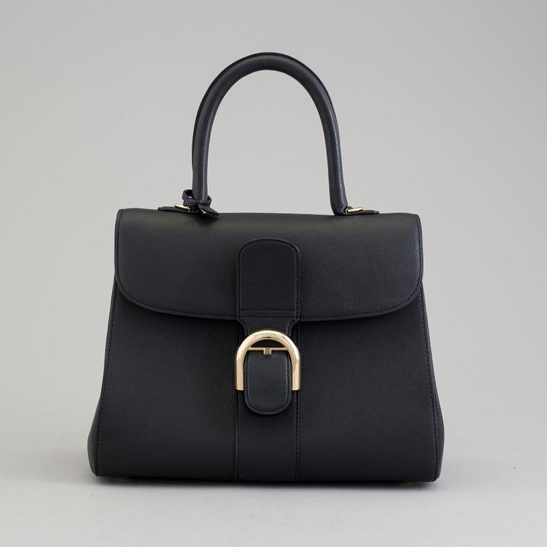 A Delvaux "Brillant" ladies handbag in black colored leather.