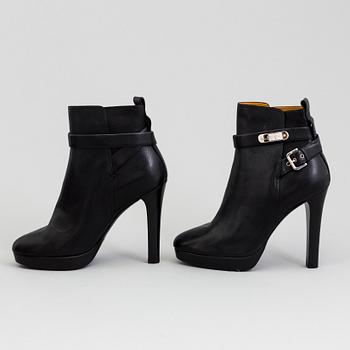 A pair of black leather bootie by Ralph Lauren.