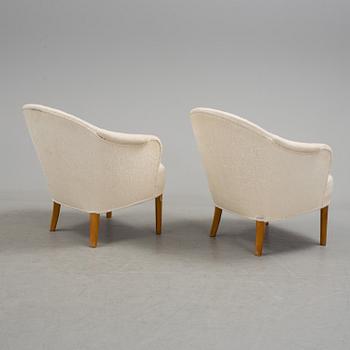 A pair of "Samspel" easy chairs by Carl Malmsten.