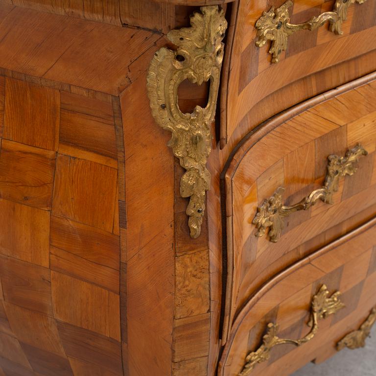 A Swedish rococo parquetry commode, later part 18th century.