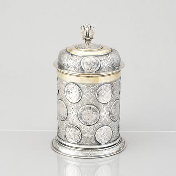 A German 18th century parcel-gilt silver coin-tankard, mark of Johann Friedrich Beyer, Schweidnitz (1736-1775).