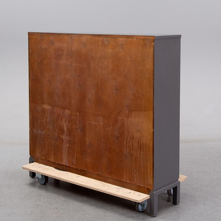 A first half of the 20th Century painted book case.