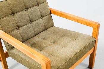 An armchair named "Stugo", designed by Reino Ruokolainen for Futura Möbler AB in Tibro.