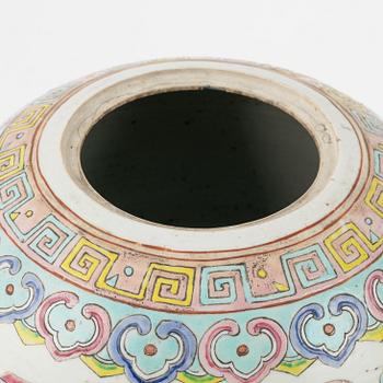 A famille rose porcelain vase, Kanton, and a porcelain urn, China, end of the 19th century.