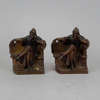 Two brass book ends, 20th century.