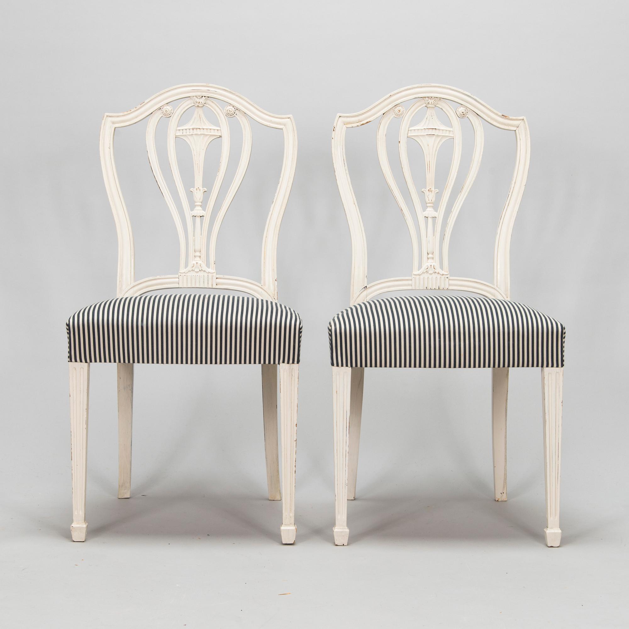Four George III style chairs, early 20th century.