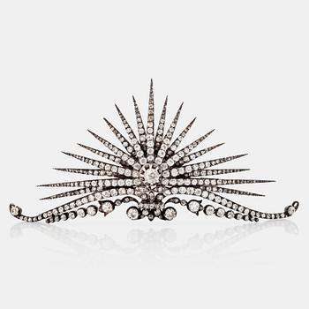 1104. An old- and rose-cut diamond tiara, possibly made by Fabergé. Fitted case signed Fabergé.