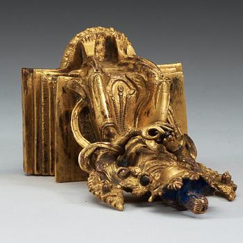 A Sino-Tibetan gilt bronze figure of Maitreya.