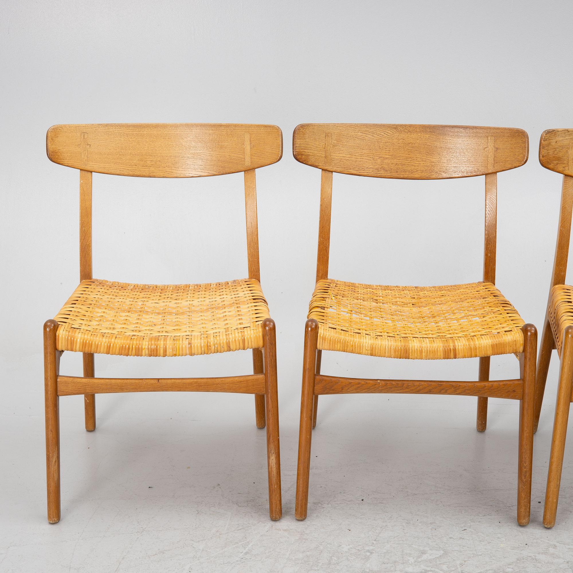 Hans J.Wegner, four dining chairs, model "CH-23",, Denmark, second half of the 20th century.