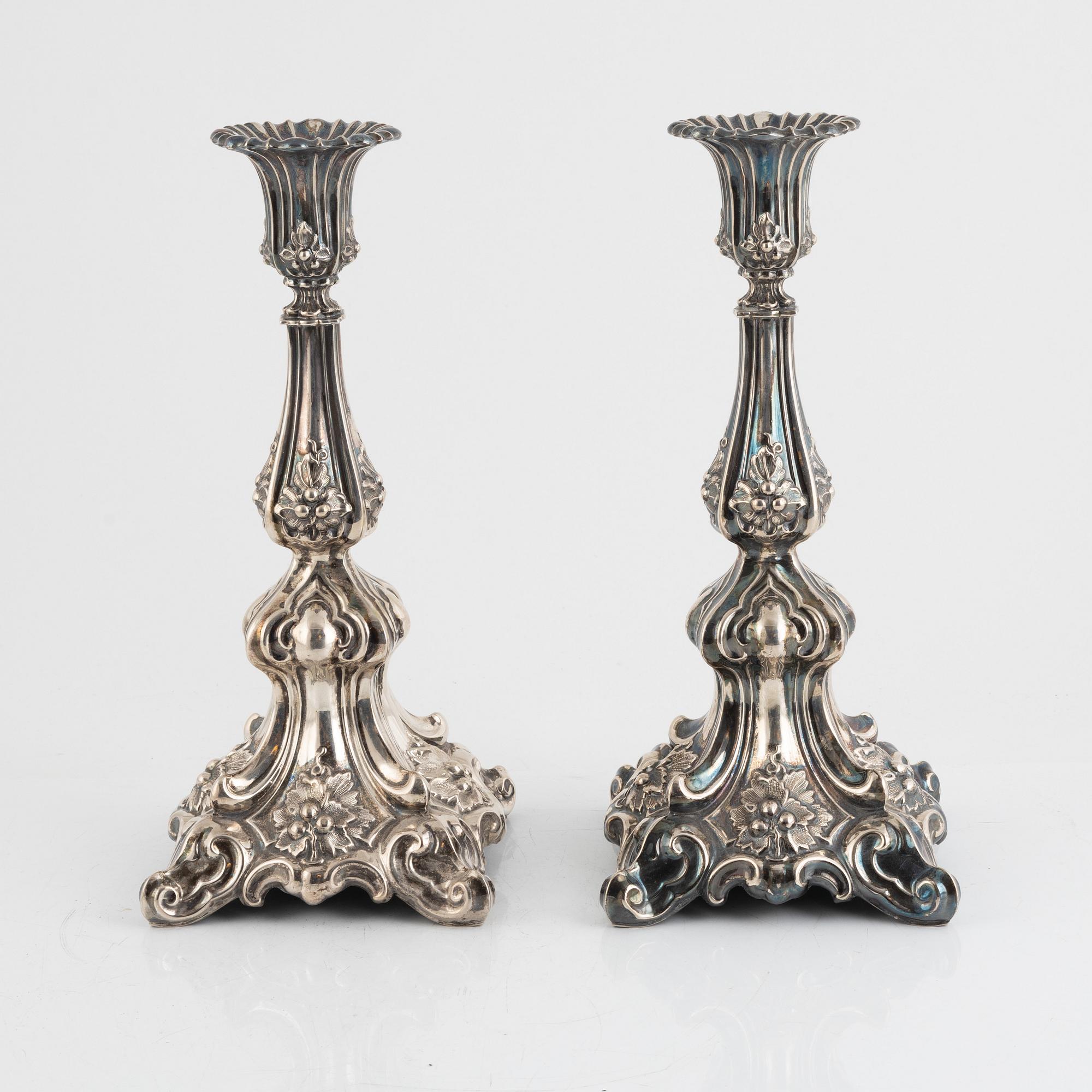 A pair of silver plated candelabra, late 19th Century.