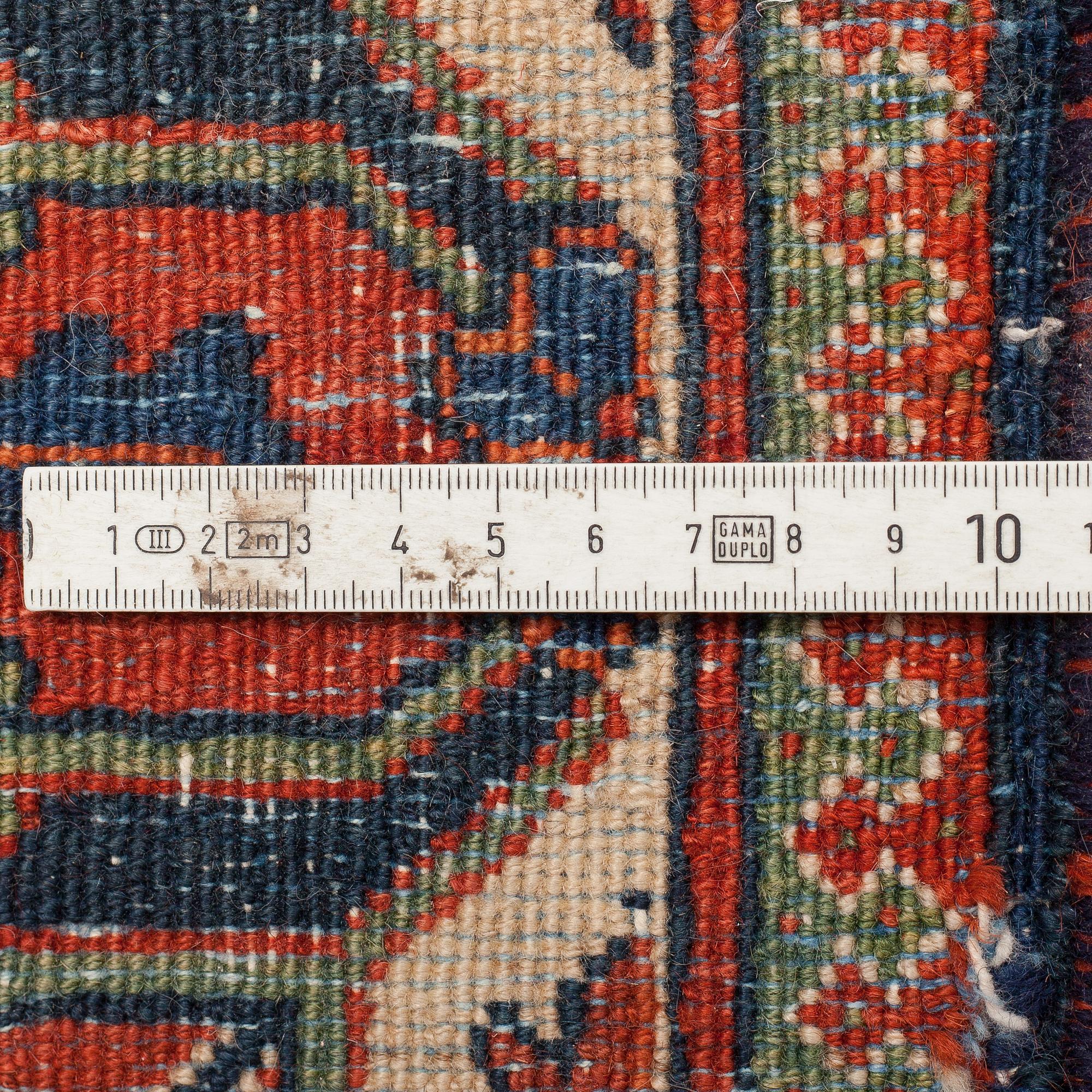 A semi-antique carpet from Joshaghan, around 348 x 190 cm.