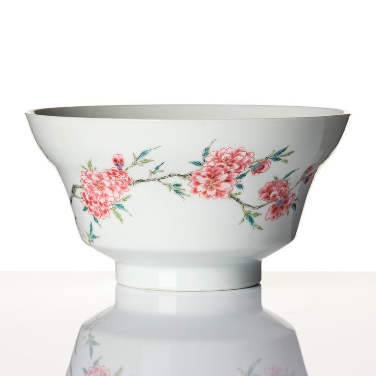 A fine famille rose ''prunus and magnolia' bowl, Qing dynasty.