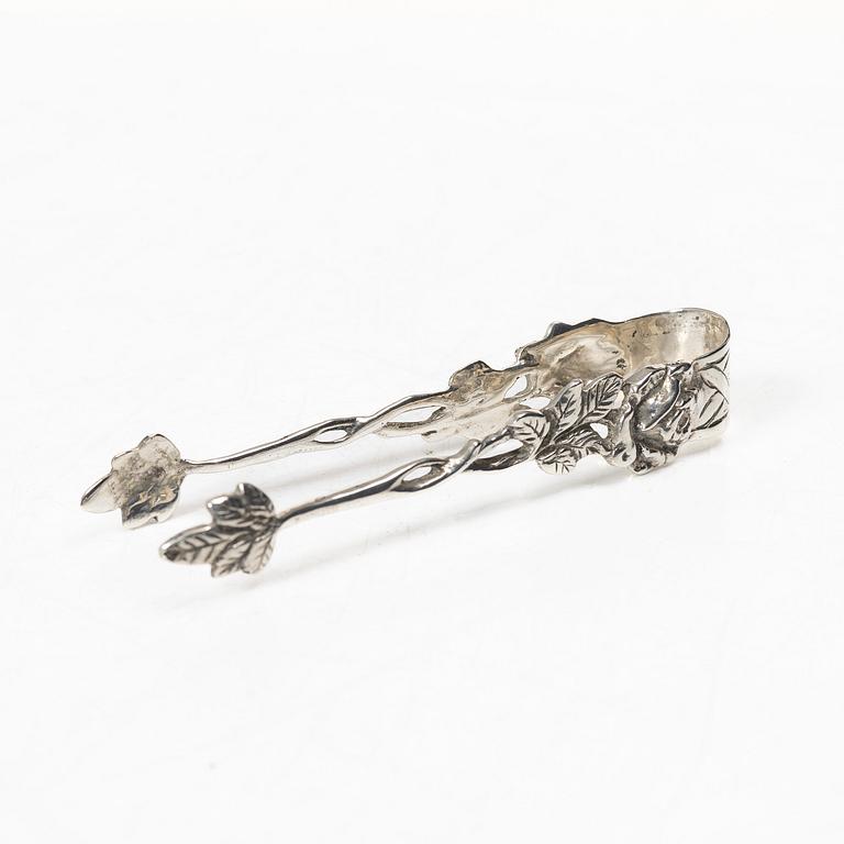 Two creamers, a tray, and a sugar tongs, silver, Rococo and Rococo style, 18th-19th century.