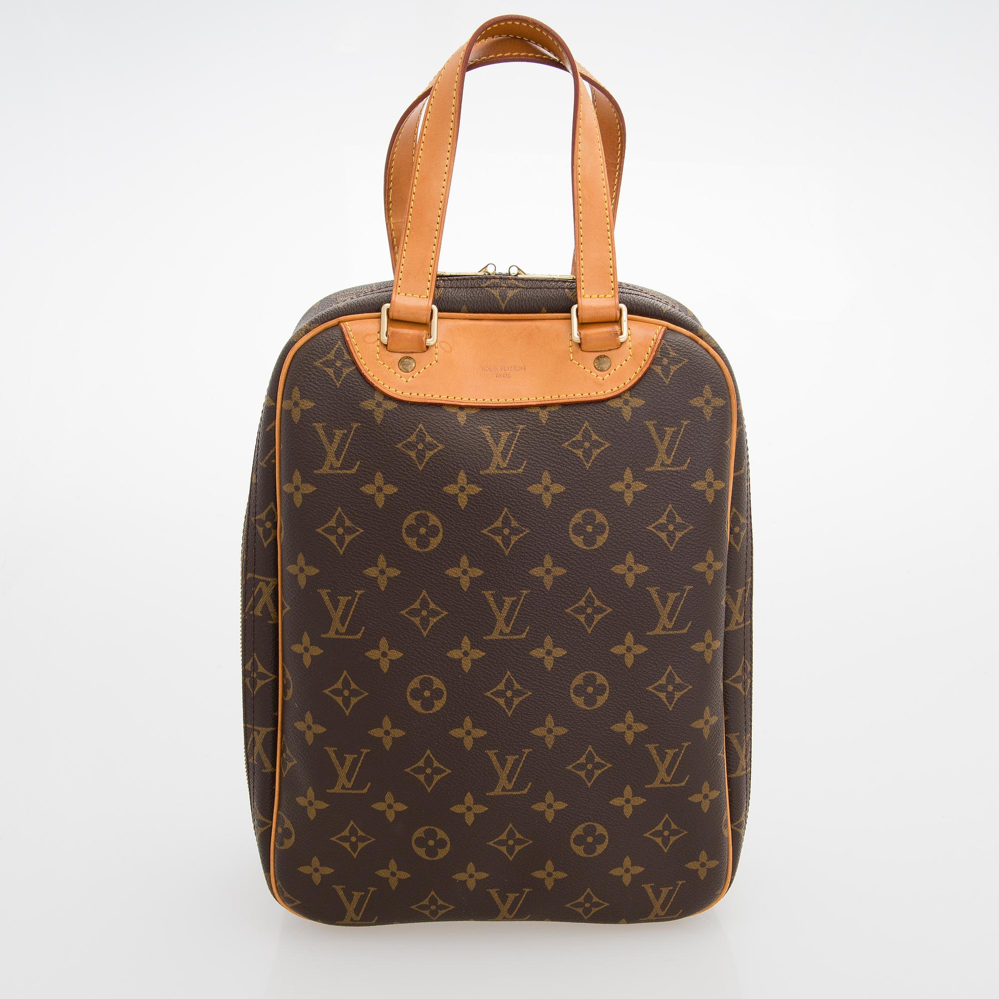 LOUIS VUITTON Monogram Canvas Excursion Bag.