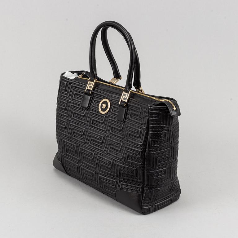 Versace, a black quilted leather handbag.