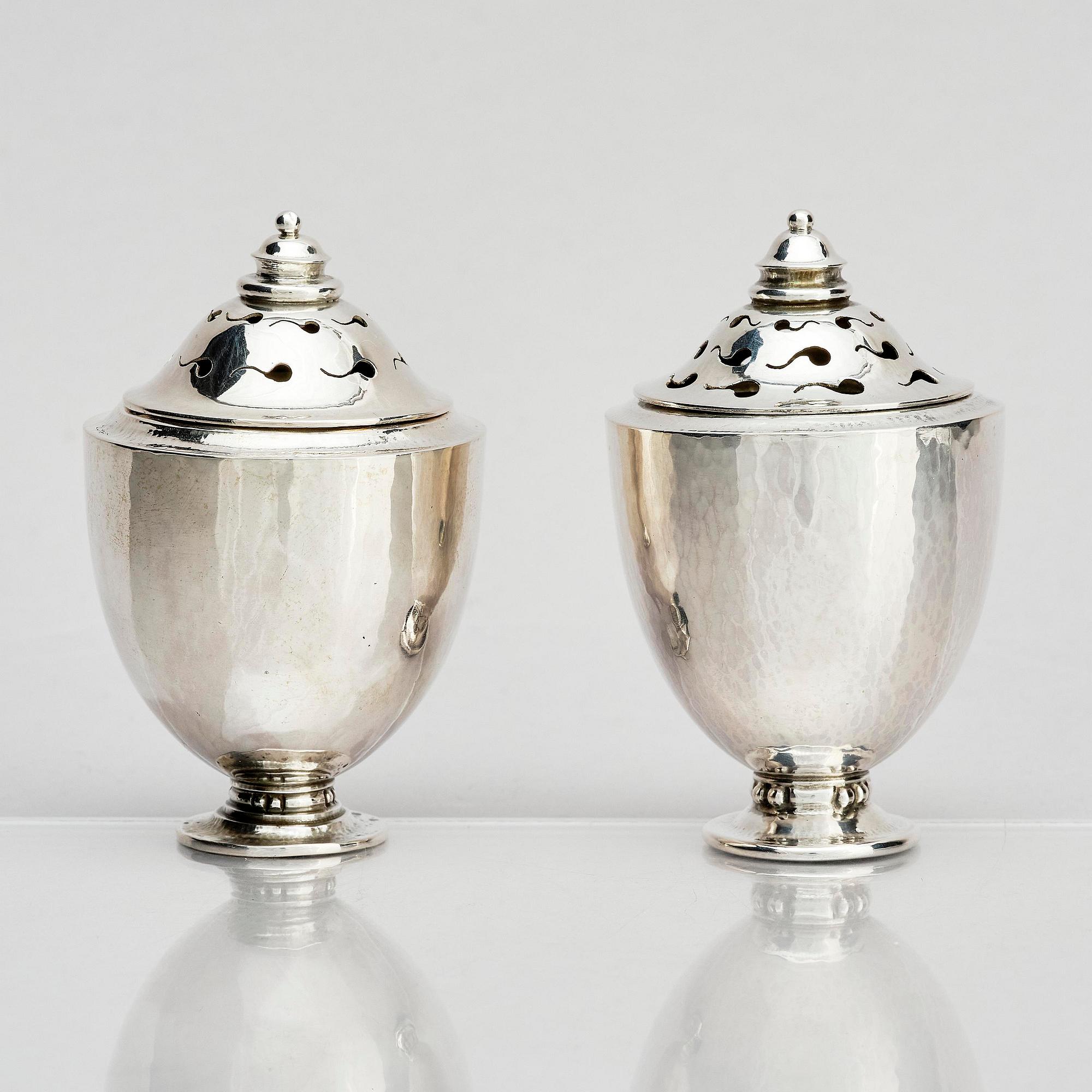 Georg Jensen, a pair of silver casters, design Johan Rohde, Copenhagen 1915-1921.