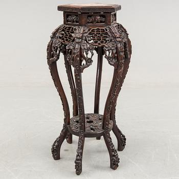 A Chinese carved wood pedestal, 20th Century.