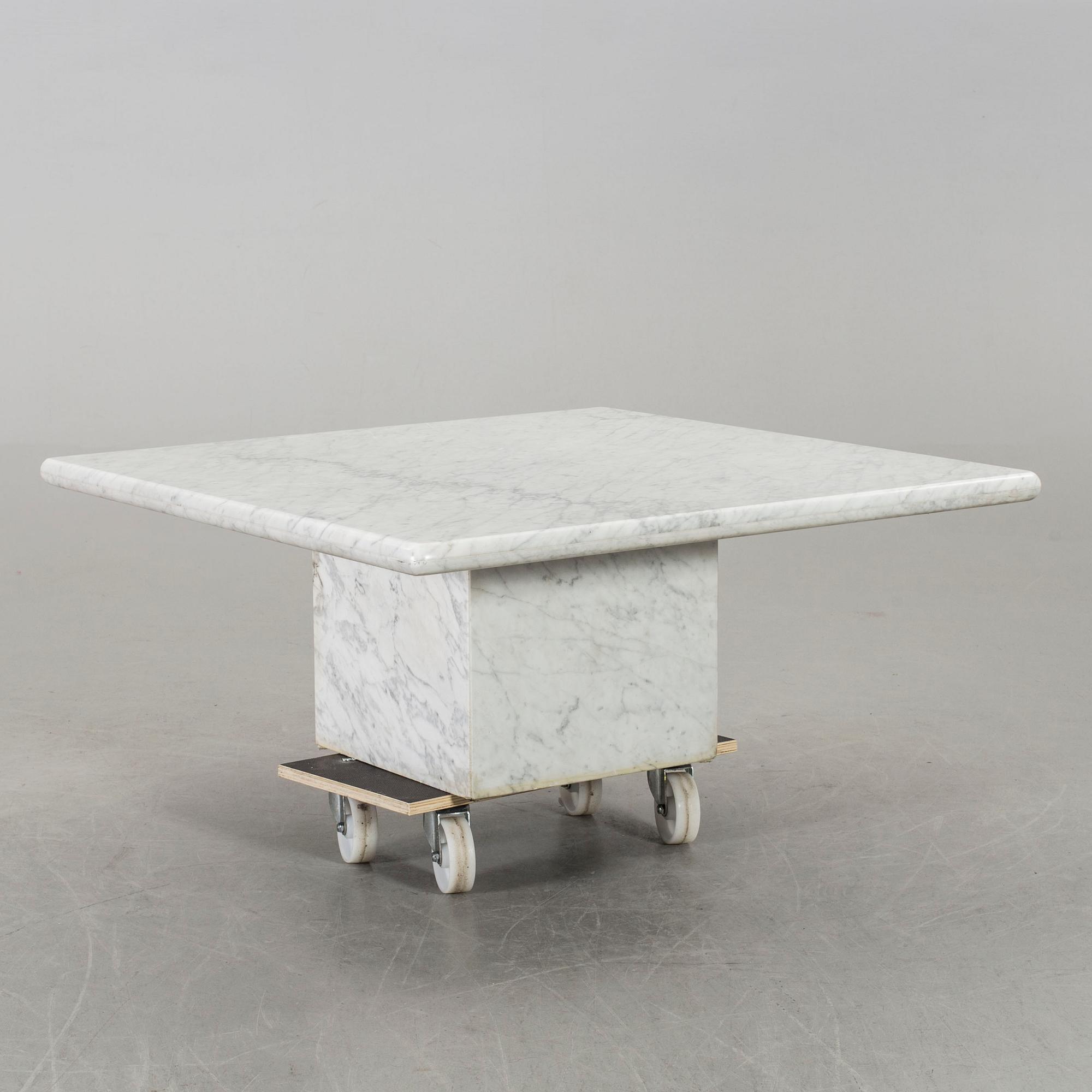 A MARBLE SOFA TABLE.