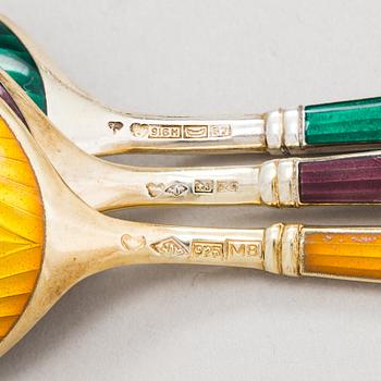 Tillander, a 12-piece set of gilt and enamelled silver ice cream spoons, Helsinki 1968-89.