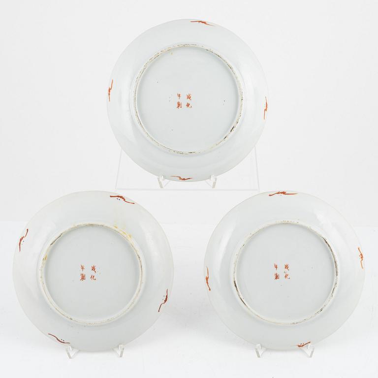 A set of three famille rose plates, Qing dynasty, circa 1900.