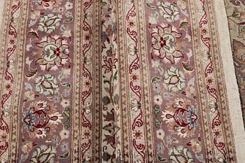 A carpet, Oriental, part silk, c. 283 x 185 cm.