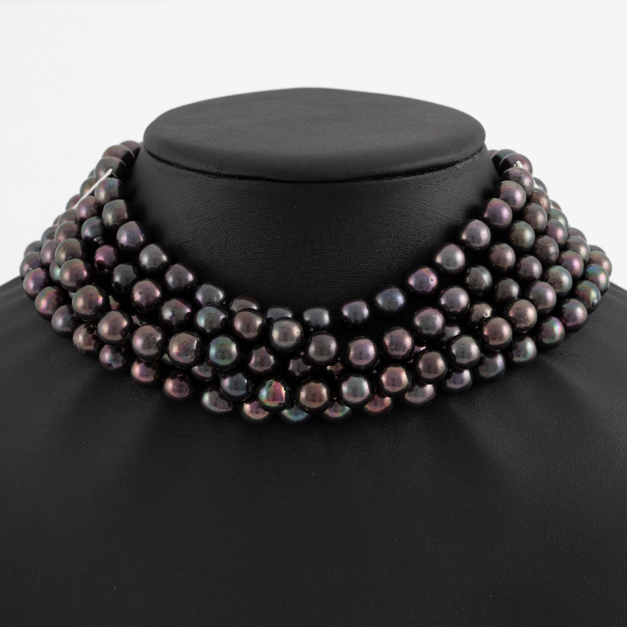 Necklace, five-row with cultured black pearls, 18K gold and white gold with brilliant-cut diamonds.