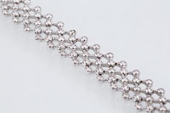 ARMBAND, 18K vitguld med briljantslipade diamanter ca 3.00 ct. Vikt 25,4 gram.