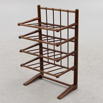 A magazine rack, mid-20th century.