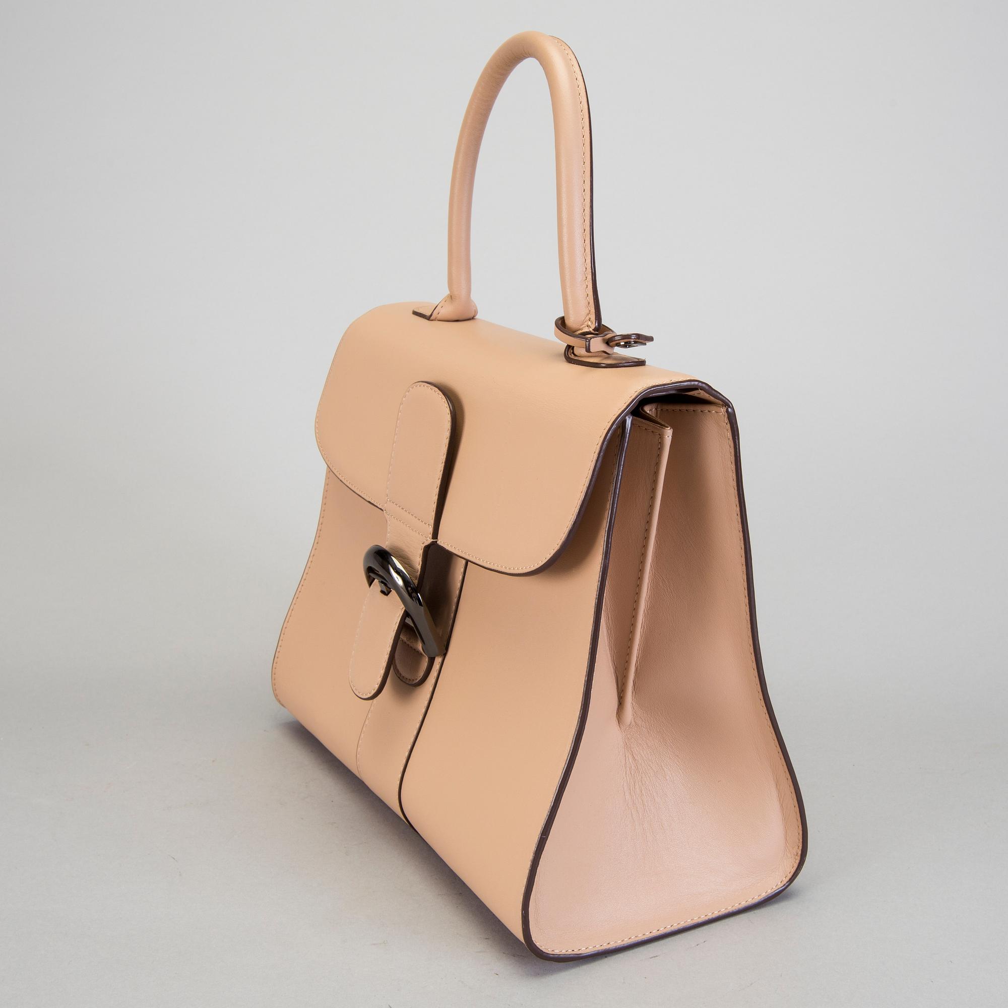 A Delvaux "Brillant" ladies handbag in nude/biscuit colored leather.