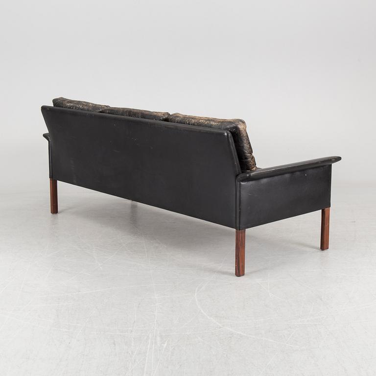 A Hans Olsen mid 20th century Danish Modern sofa, pair of lounge chairs and coffee table for CS-Möbler, Denmark.