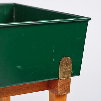 Josef Frank, a rare flower table with green lacquered box model B 2084, Firma Svenskt Tenn, 1950-60s.