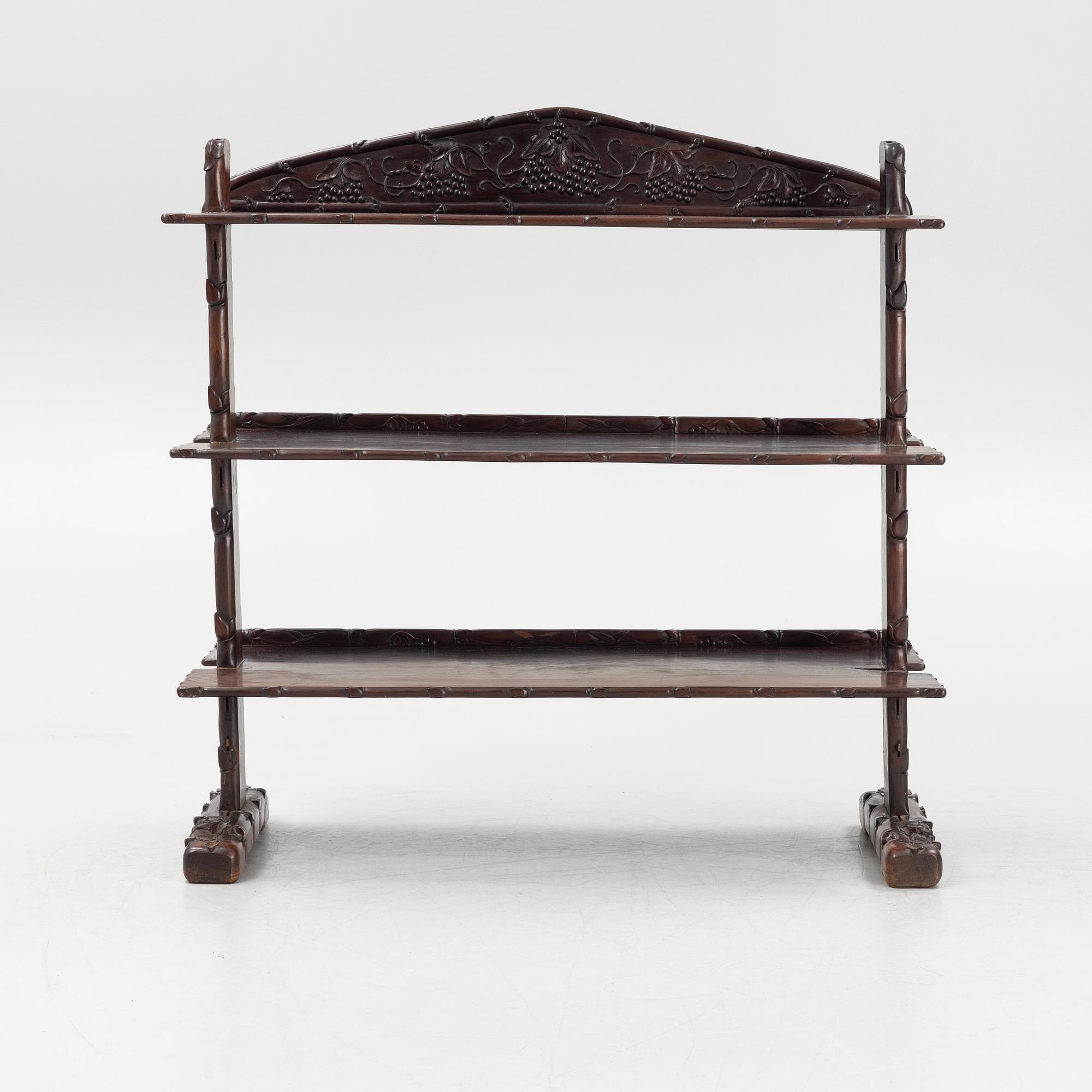 A Chinese hardwood shelf, 20th century.