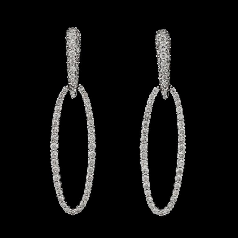 A pair of diamond earrings, total carat weight circa 1.50 cts.