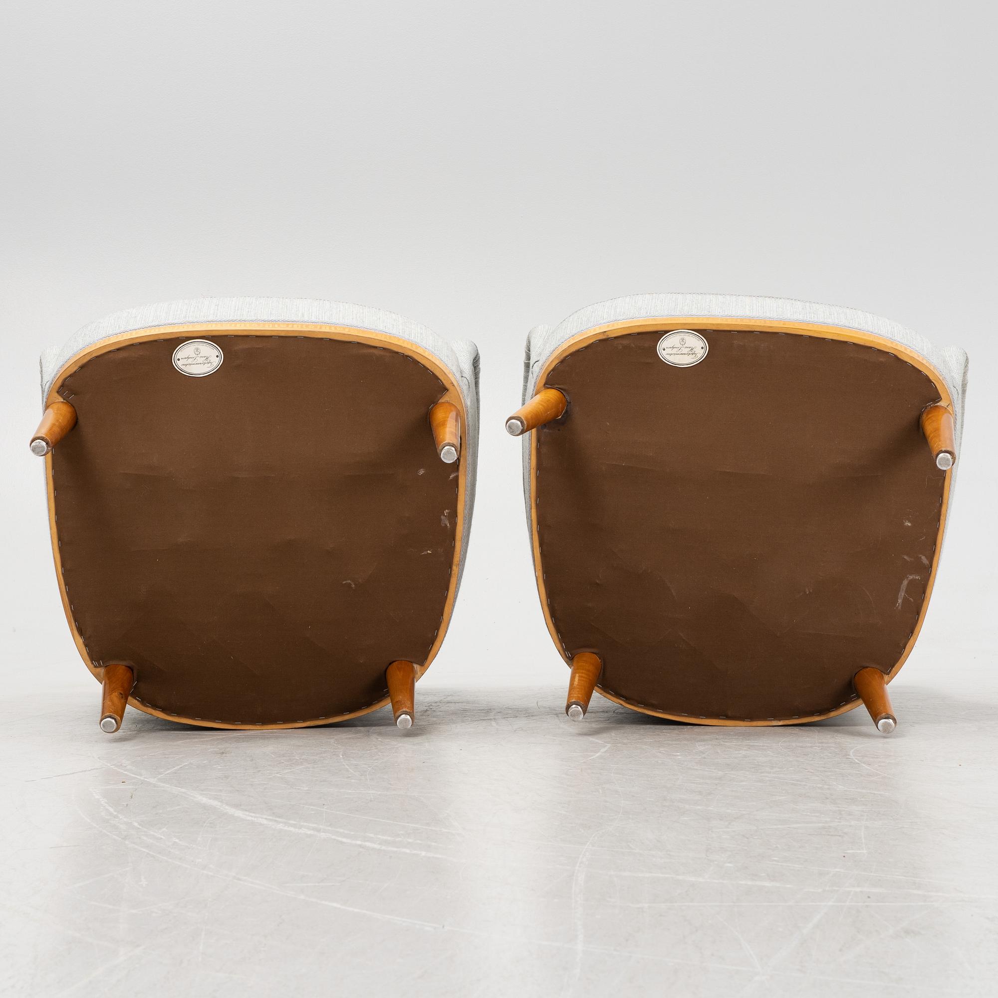 Carl Malmsten, attributed to. A pair of inlay easy chairs, mid 20th Century.