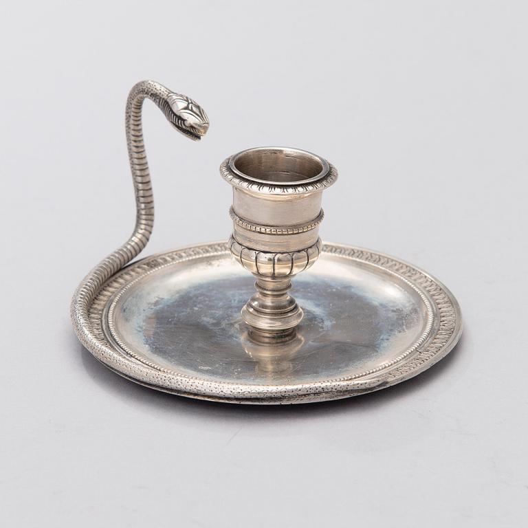 An early 19th century silver chamber candlestick. total weight 170 g.