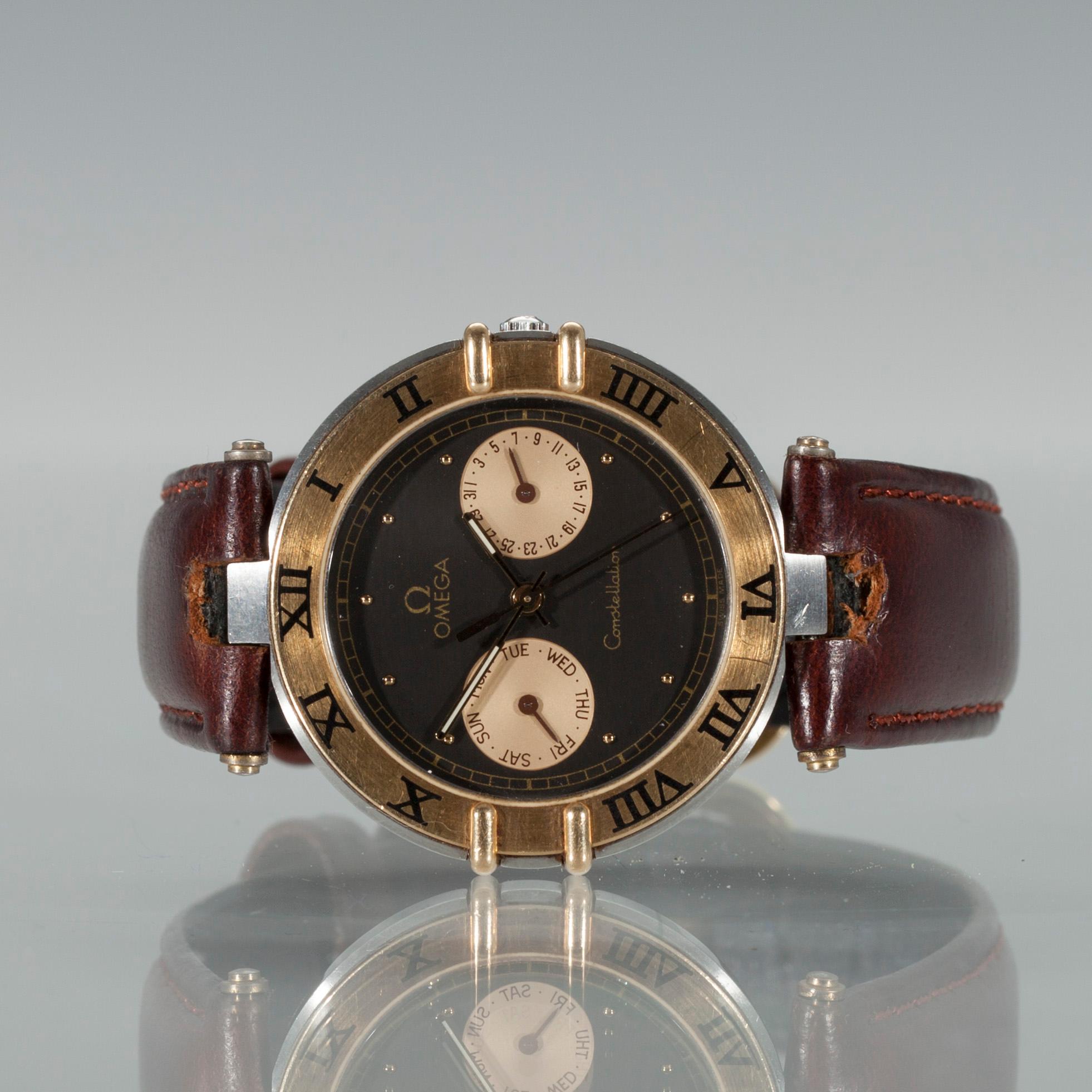 ARMBANDSUR, herr, Omega Constellation, guld och stål.