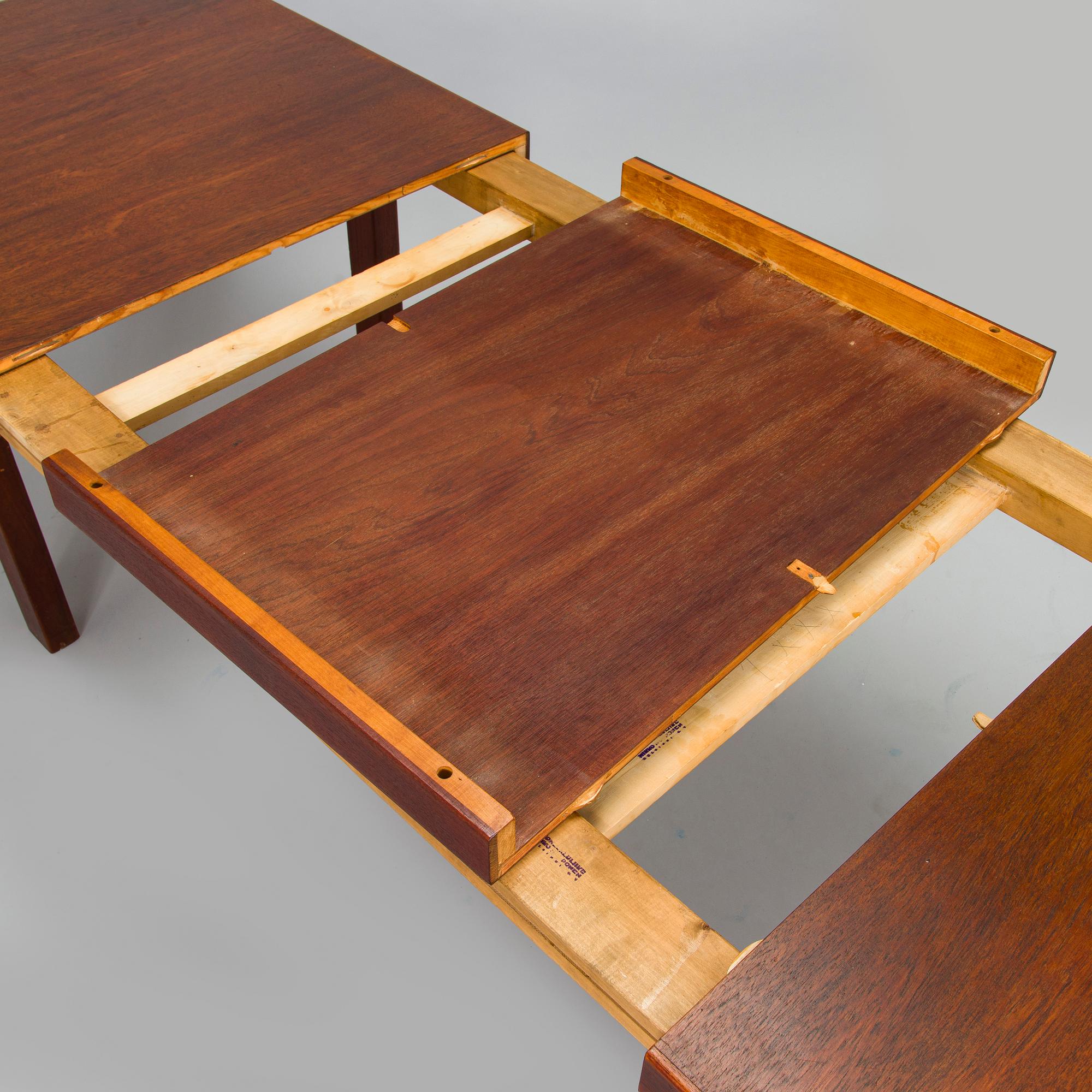Carl Gustaf Hiort af Ornäs, a mid-20th-century 'Näyttely Senior' dining table and 12 chairs for HMN Huonekalu Nupponen.