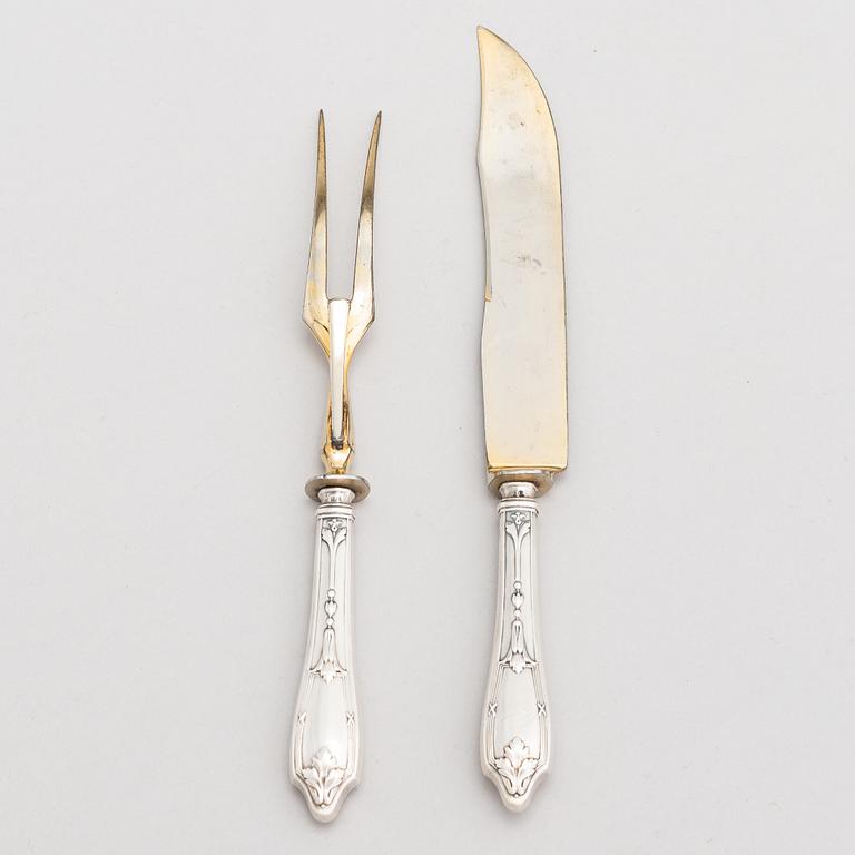 A carving set, silver handles by Grachev brothers, Saint Petersburg, Russia 1908-17.