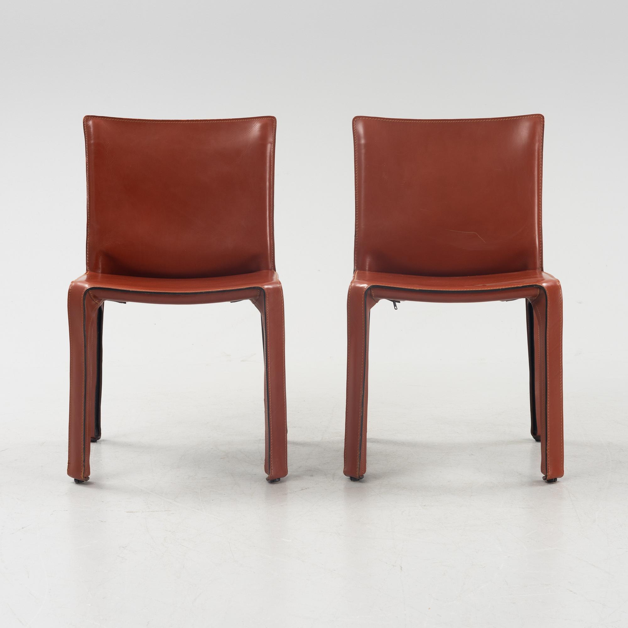 A pair of model 412 CAB chairs by Mario Bellini for Cassina.