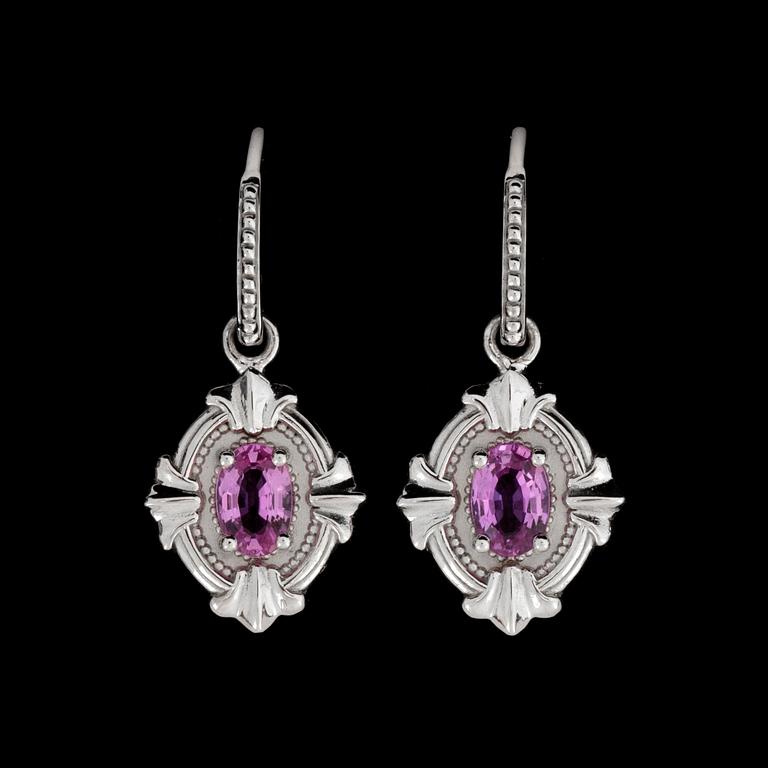 A pair of pink sapphire, circa 1.25 cts in total, earrings.