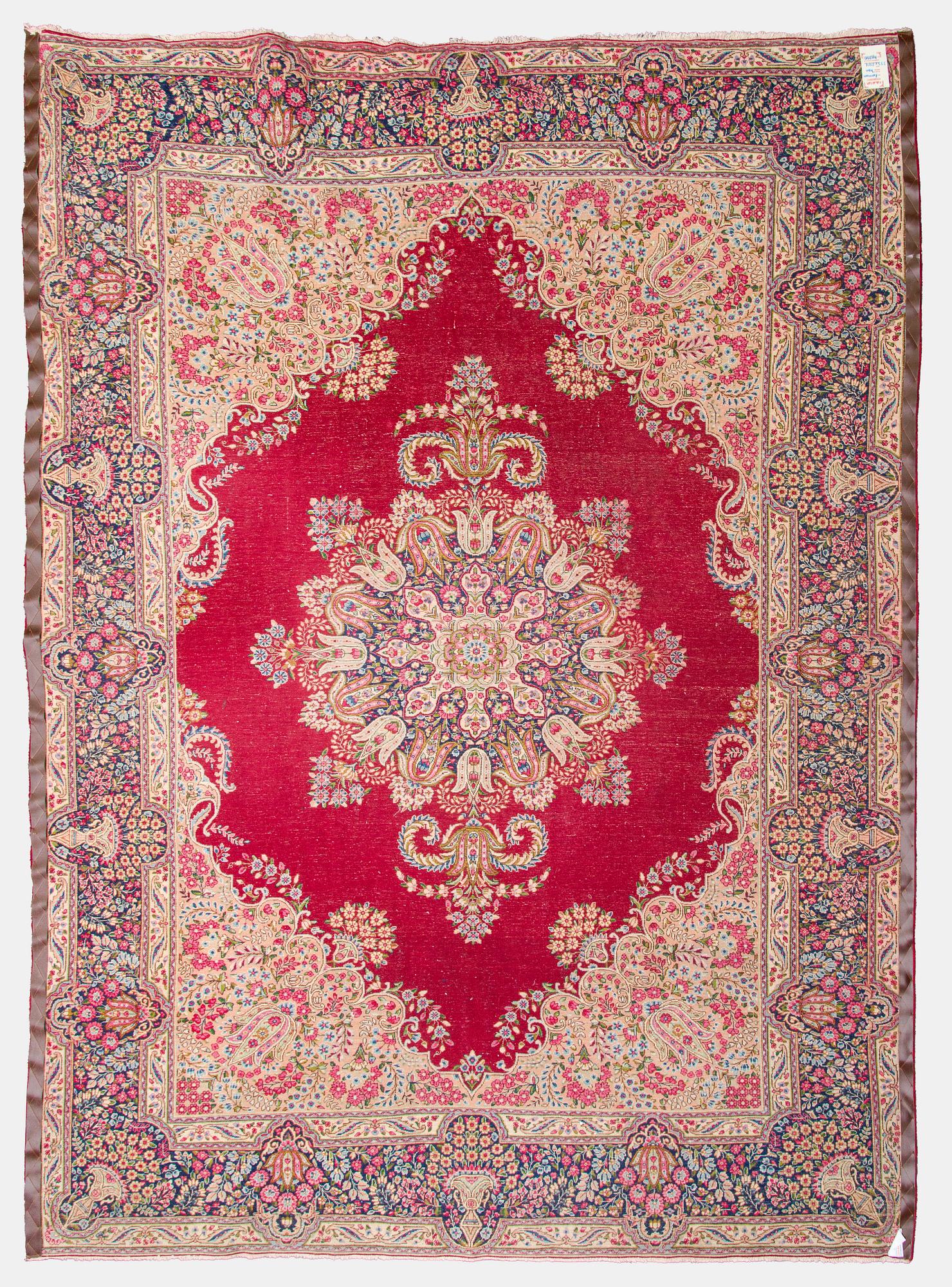 A carpet, Kirman, ca. 333 x 244 cm.