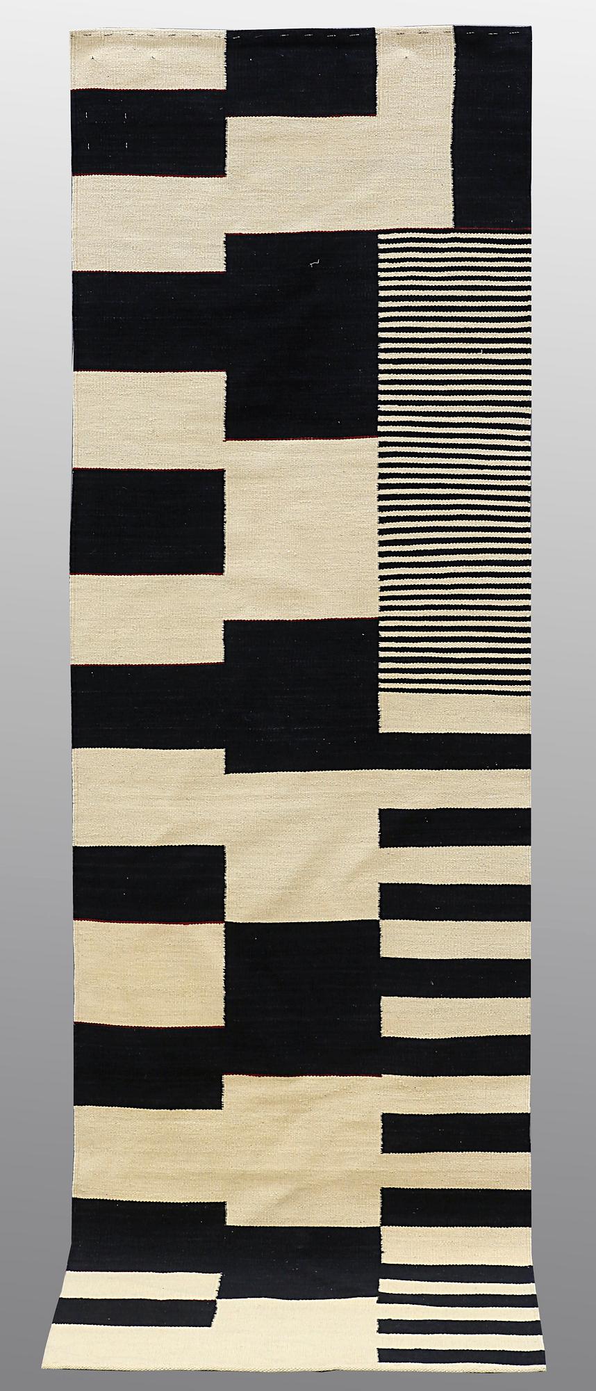 A runner, flat weave, ca 296 x 78 cm.