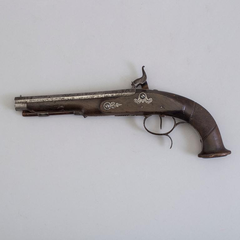 A 19th century percussion pistol.