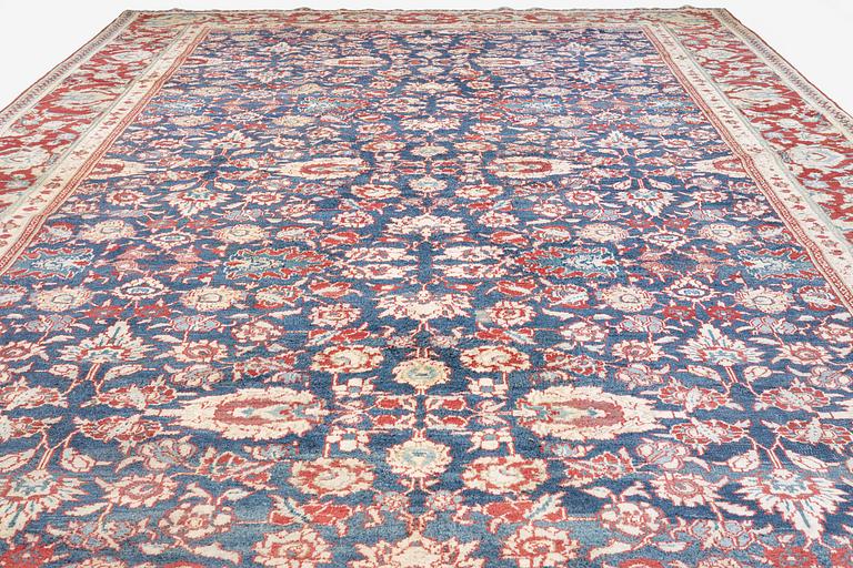 An antique cotton Agra of 'Ziegler Mahal' design, Northern India, c. 647 x 330 cm.