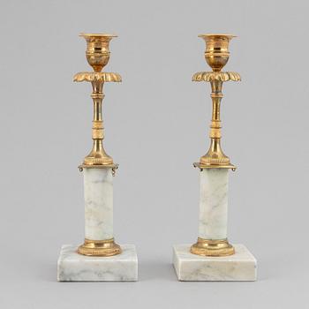 A pair of late gustavian candlesticks, ca 1800.