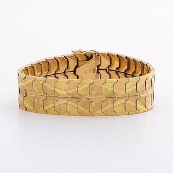 An 18 Carat gold bracelet, length 18 cm, weight 35,6 gr.