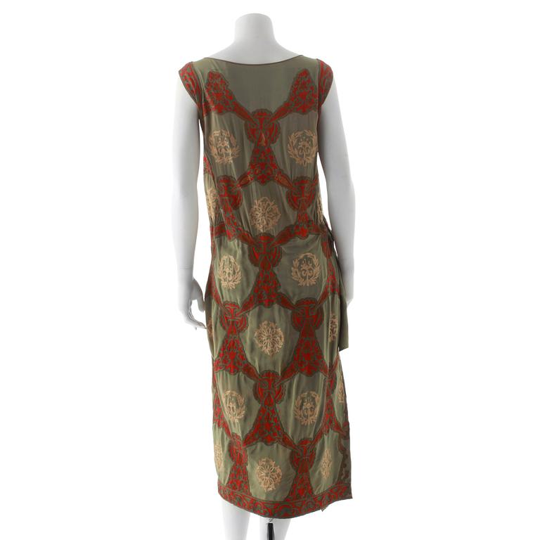 DRESS, green silk from the 1920s.
