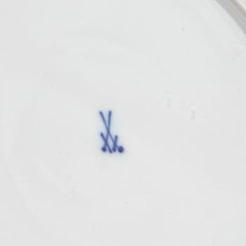 A set of five Meissen porcelain games plates, late 19th to early 20th century.