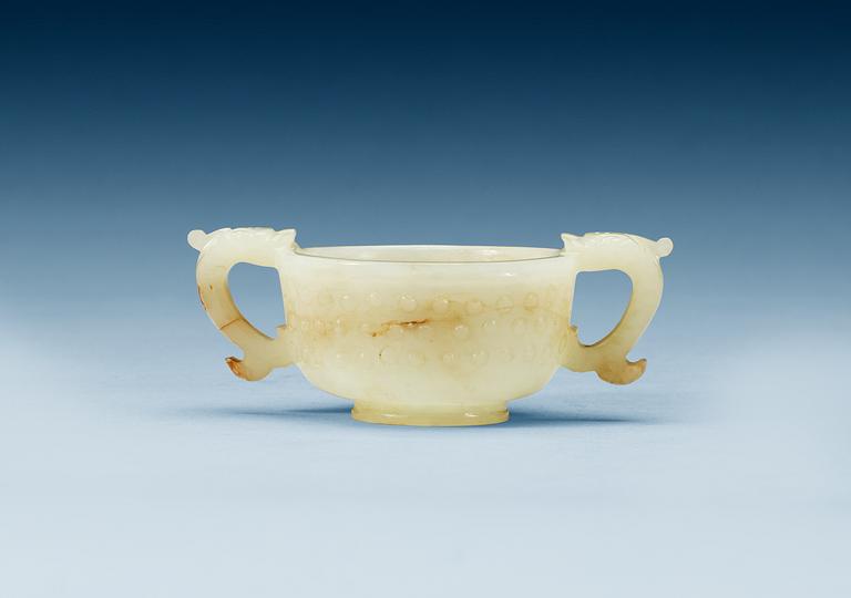 A archaistic nephrite wine cup, Qing dynasty.